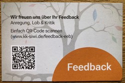 ... und bat auf der Rückseite des scheckkarten-großen Werbe-Flyers um ein Feedback für die Veranstaltung. (Fotos: Jens Gesper)